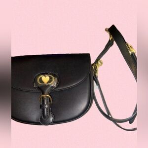 Chic Black Crossbody Bag with Gold Accents
